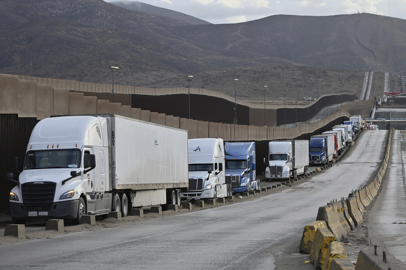 Trucks at the U.S.-Mexico border. (AP)