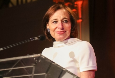 Susan Segal at a podium