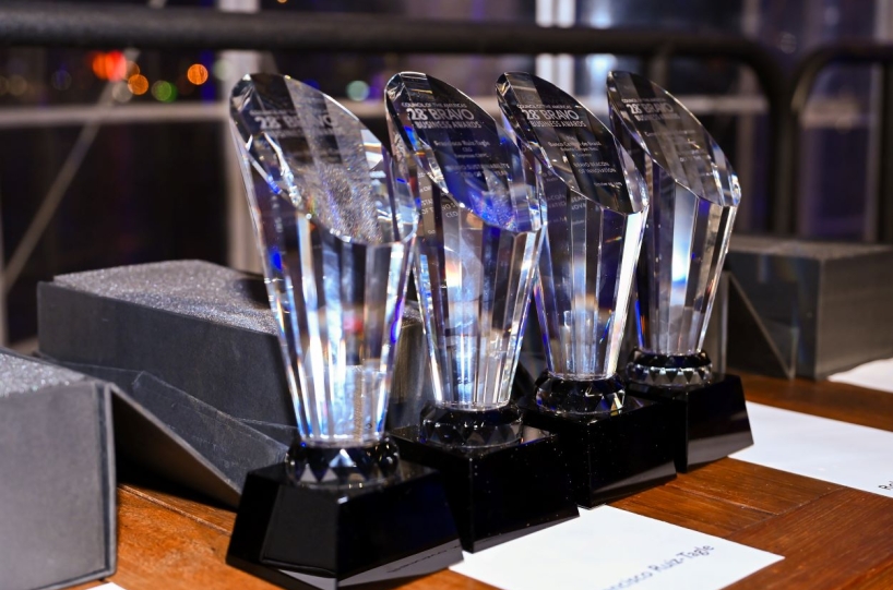 Four awards standing next to each other